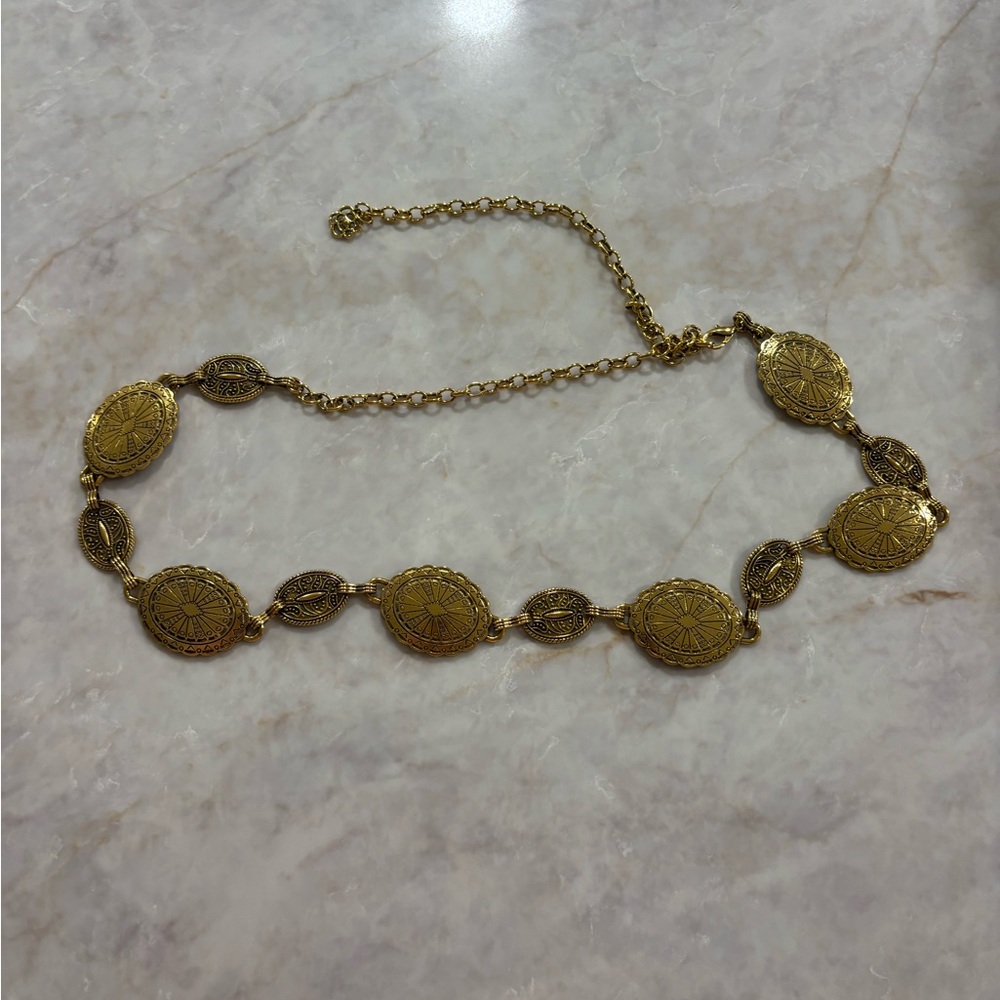 Gold statement belt